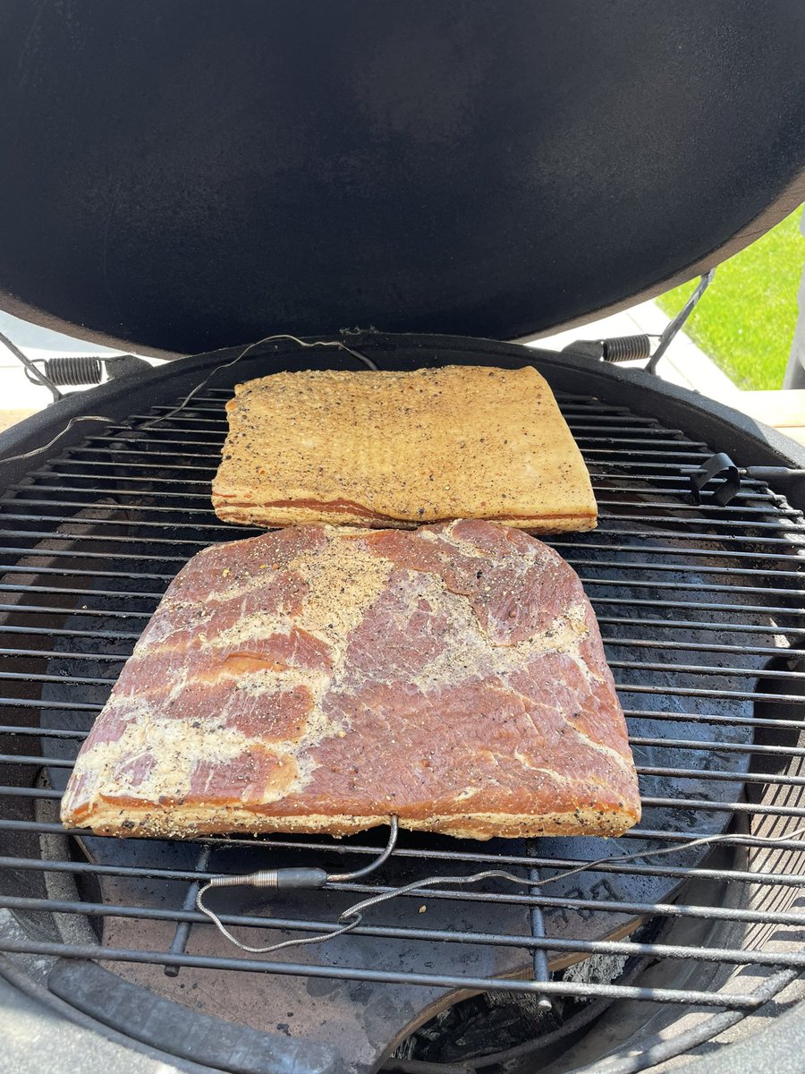 GunthorTM's tweet photo. After a morning walk with my Mom and Daisy I put pork belly on my @BigGreenEgg using @SteveRaichlen made from scratch bacon recipe from Project Smoke on half the other I used the recipe and added more pepper & seasonins #bge #bgenation #projectsmoke https://t.co/mtqBMZNnWL