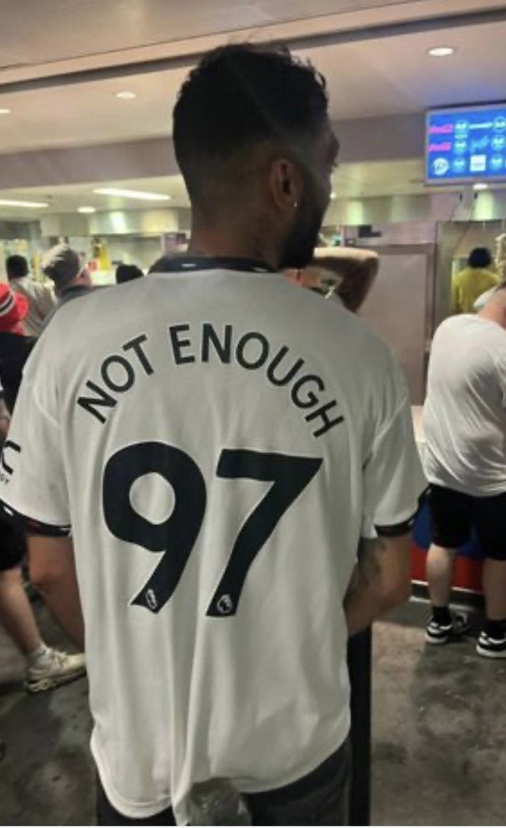 Struggling to find why someone would buy a shirt, then get numbers and words printed on it to then display it at a football match. Who'd print it?

Can we just end this shit now? This isn't partisan fandom, it's celebrating tragedy that today, now, hurts so many.

Enough. Enough.