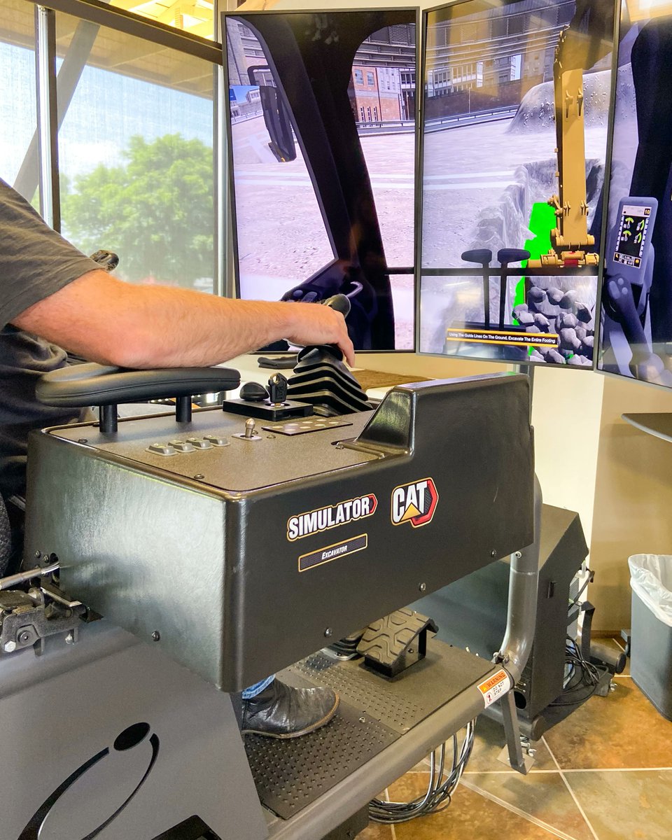 WarrenCAT's tweet photo. We had the opportunity to test out Cat simulators with the Association of Oklahoma General Contractors. These simulators will be used for safety and efficiency training for contractors and other organizations! #WarrenCAT #AOGC #Caterpillar #CatSimulator #LetsDoTheWork https://t.co/6LLPURWQsB