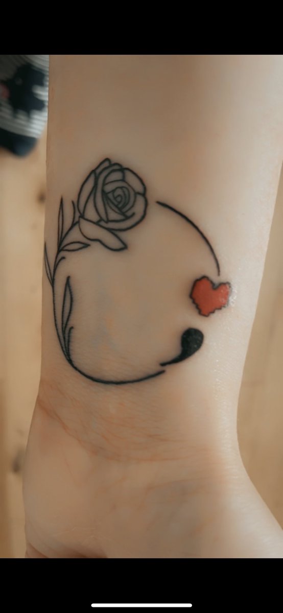 circus_katx's tweet photo. Last week I got my first tattoo ☺️ Undertale heart in a semi colon with my favourite flower ❤️ https://t.co/i0m1017cEW