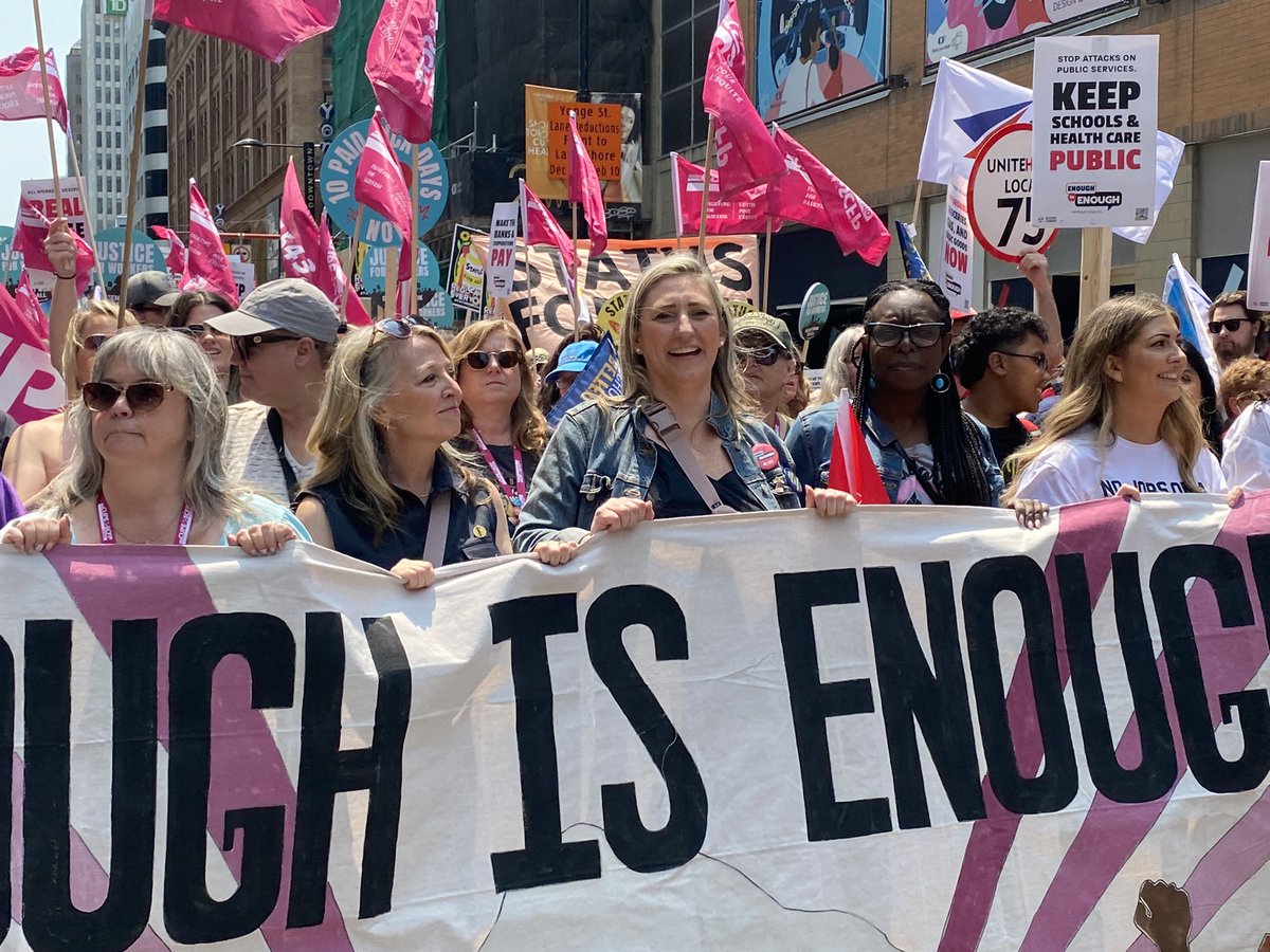 ETFOeducators's tweet photo. Leading the march up Yonge Street in Toronto @ETFOpresident says “Teachers and education workers stand shoulder to shoulder with workers in all sectors. We stand with everyone struggling for a better, more just future.” #EnoughIsEnoughON #onpoli https://t.co/0J4usOTUzY