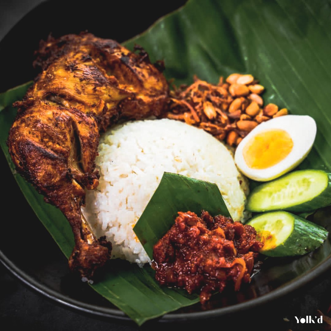 Start the day on a flavorful note with our signature Nasi Lemak! 🍛 

#malaysianfood #dubaieats #nasilemak #malaysianfood #foodie #asiancuisine #spicydelights #coconutrice #sambalsauce #friedchicken #crispyanchovies #pandanflavor #breakfastgoals #ricelovers