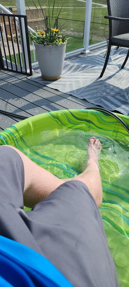 Central Canada and 32 degrees Celsius and taking full advantage of the foot pool! #heatwave #poolside #Canada #hot