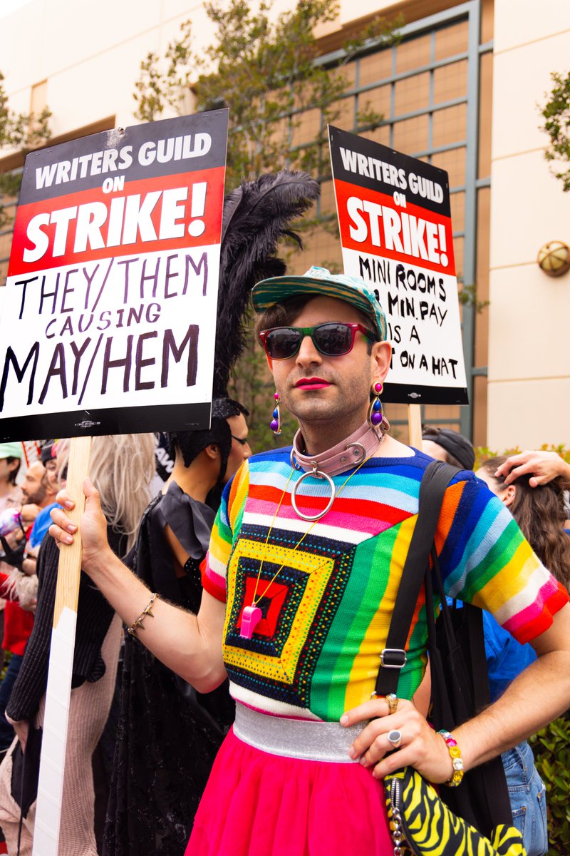 Meet <a href="/JacobTobia/">Jacob Tobia</a>, a TV writer developing a show for Max. Why they're striking: Call me conservative because my non-binary ass doesn't want to be replaced by a robot, unless that robot is vacuuming my apartment. #WGAStrike #WGAStrong #HappyPrideMonth 🌈