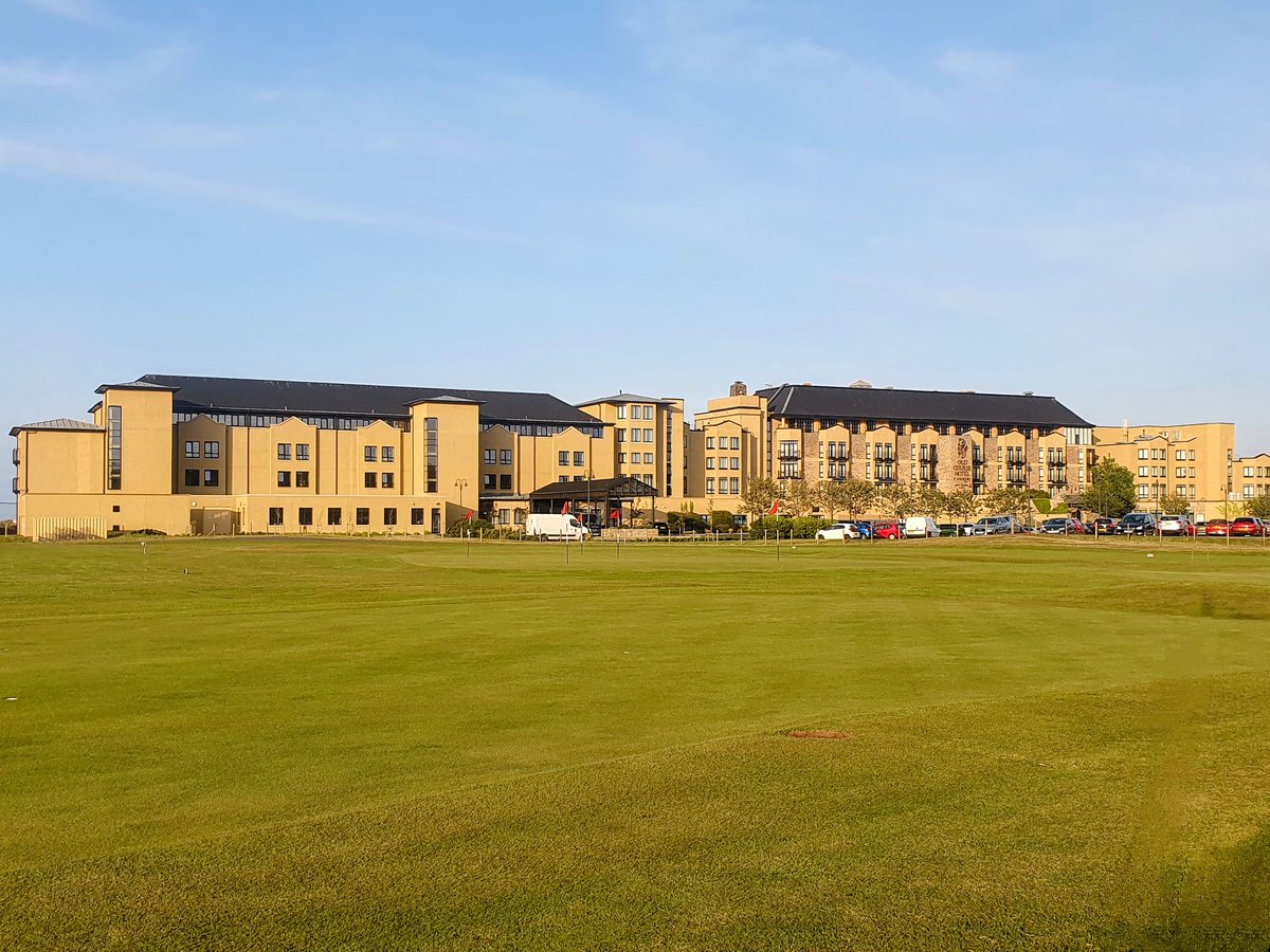 Golden hour at the #OldCourseHotel is truly a sight to behold. As the sun sets, our drivers are ready to provide you with a luxurious ride home. Choose #StAndrewsTaxis for your travel needs. #ComfortRide #FifeBeauty
