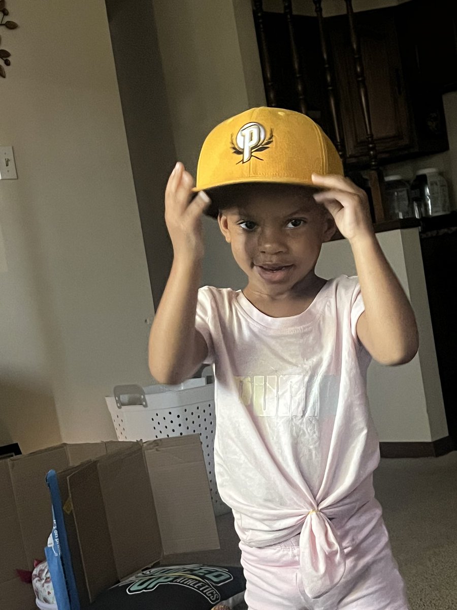 JolieNGriffith's tweet photo. She said, “Daddy Look…Take a picture!” 😩😩 Slowly but surely getting into Softball 🥎 mode…First the gear…now the Hats. Daddy’s Little Princess never disappoints! 
-
#baseball #toddlers #julianandbabyjolie #blessed #goodtimes #daddydaughter #daddydaughtertime #softball https://t.co/YM4MxcxqEU