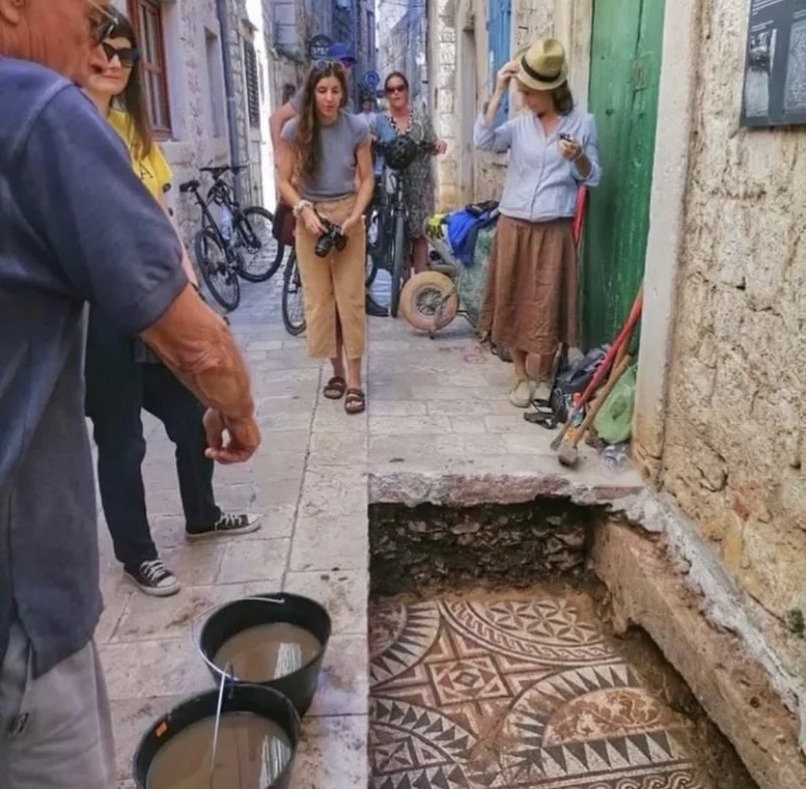 historyinmemes's tweet photo. Archaeologists made a remarkable discovery in 2022 when they unearthed a collection of Roman mosaics in the charming city streets of Stari Grad on Hvar Island, Croatia. These mosaics, renowned for their exquisite artistry, are believed to have adorned a structure that belonged to an individual of great importance during the second century BCE. In order to preserve their integrity, the local museum intends to construct a replica of the mosaic for public exhibition, ensuring that the original remains safeguarded within the confines of the museum.