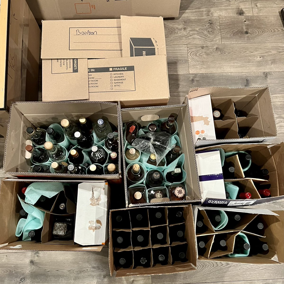 TReillyDawg's tweet photo. @mygodapodcast @DawgBourbon packing for the big move is tough, especially when you have to transport a bourbon and wine collection. #stoppedcountingat250 #drinkinproblem #athenstailgates https://t.co/MlhVqifHLQ