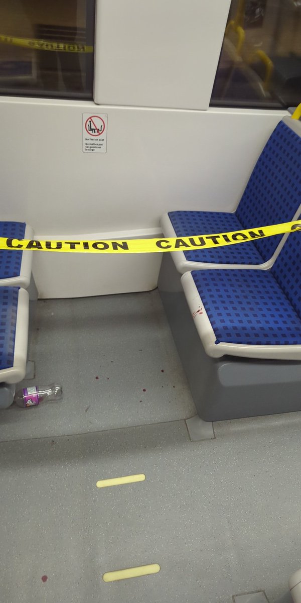 ColtonH2000's tweet photo. @OccTranspo hey I'm on the o-train heading eastbound, there is caution tape on this train and blood on some of the seats and floor.  They shut down trains for nothing it seems but when something like this happens, it still runs??!!! https://t.co/l0affE4QFU