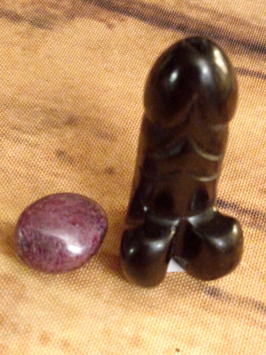 My latest addition to my stone collection: a ruby and a ... Phallic obsidian 😅