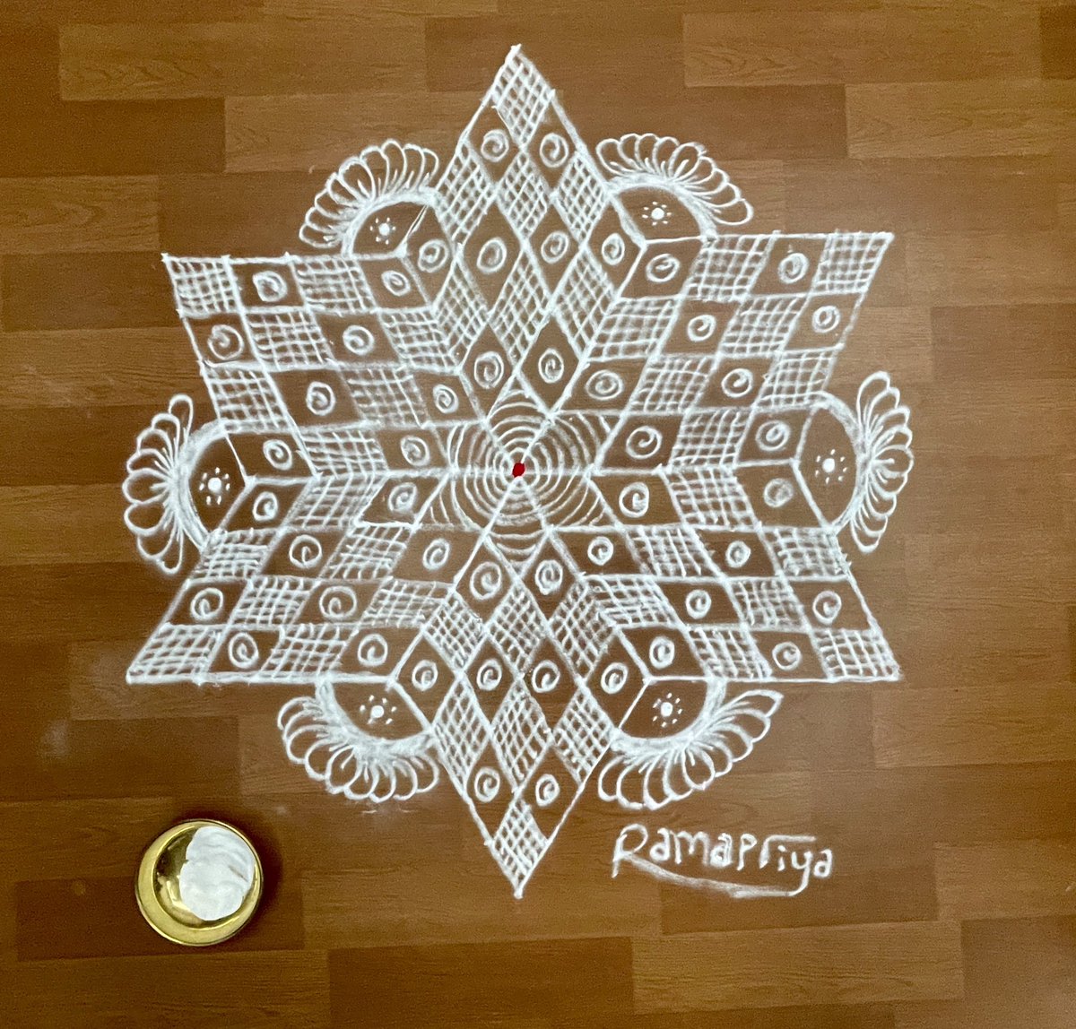rramapriya's tweet photo. A Star made of rhombuses. How many rhombuses do you see? How do you know? What was your counting strategy? If you had to sort these rhombuses how would you categorize &amp; sort? Can’t wait to hear my students’ thinking. #kolam #geometry  #meditativedrawing #indiantraditionalart https://t.co/WiT7djyN2j