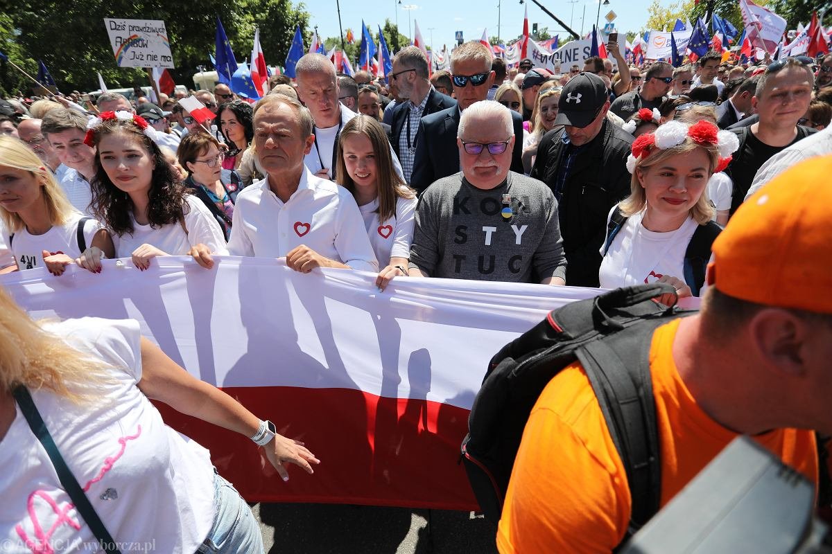 #LechWalesa and #DonaldTusk open the #FreedomMarch in Warsaw. The date is symbolic. On June 4, 1989 the 1st partially free elections since WWII took place in Poland. Today Poles march in protest of the unlawful rule of, oh cruel irony, the #LawAndJustice party.