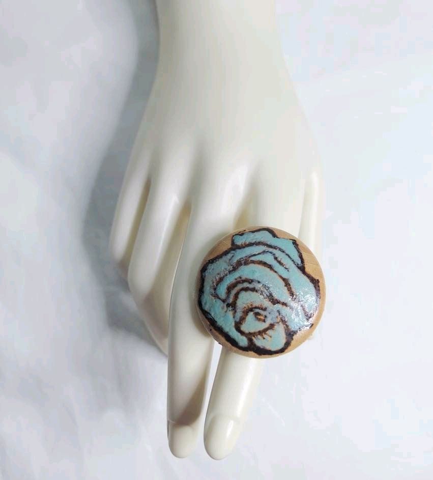 Transform your wardrobe with our beautiful Bohemian Floral Blue Rose handmade wood ring. Handcrafted with love, each piece is unique and adds a touch of elegance to your outfit.  Shop now on Etsy!🌹🌿 #handmade #Bohemianstyle #Etsyshop etsy.com/listing/272343… #fashion #style