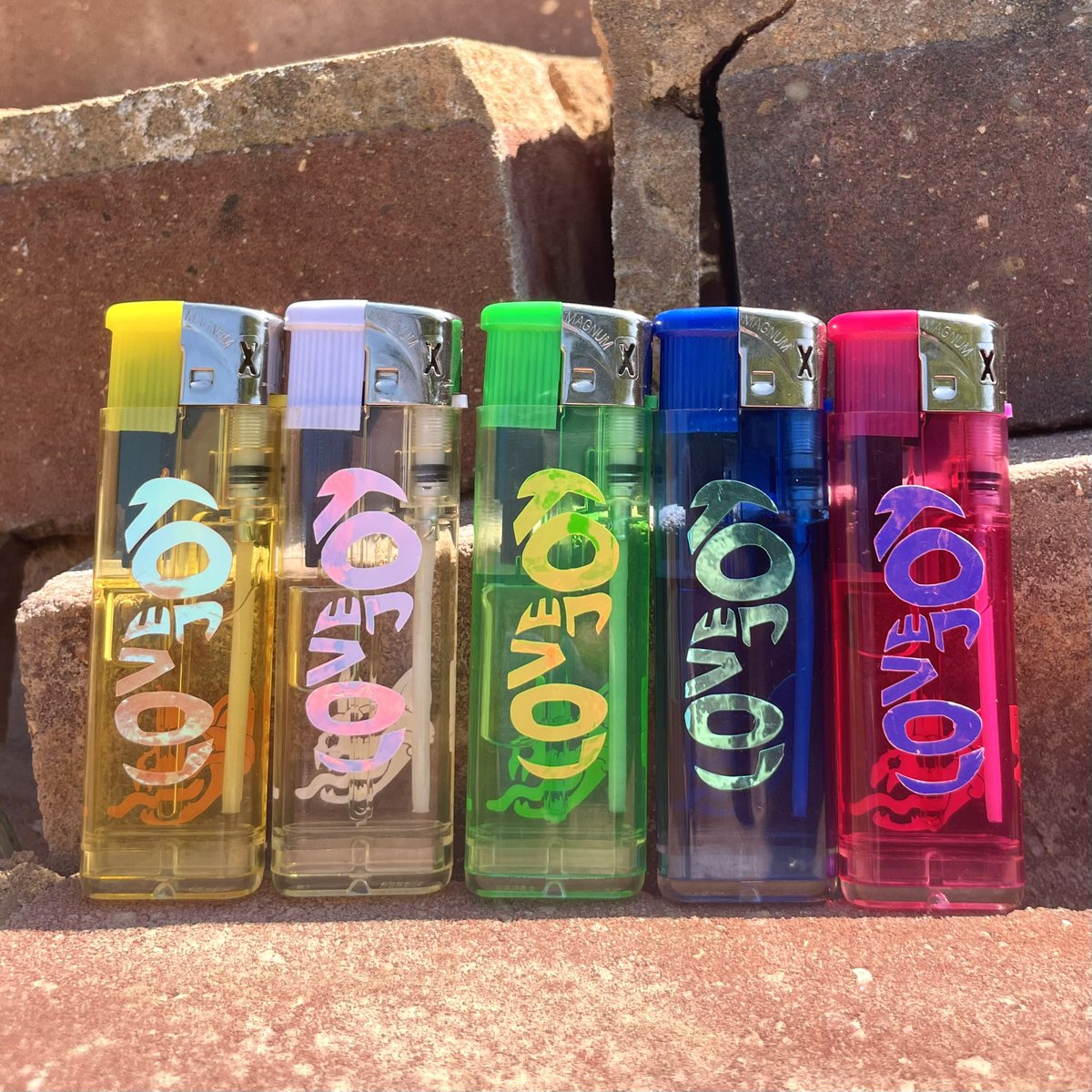 fguac_'s tweet photo. LoveJoy lighters are now up !!

Only 20 in stock right now so you gotta be quick :)

Vids in tweet below of the colour options. 

I hope you like them🌈✨

https://t.co/RR5nUP0FnR https://t.co/swnLAgUYwC