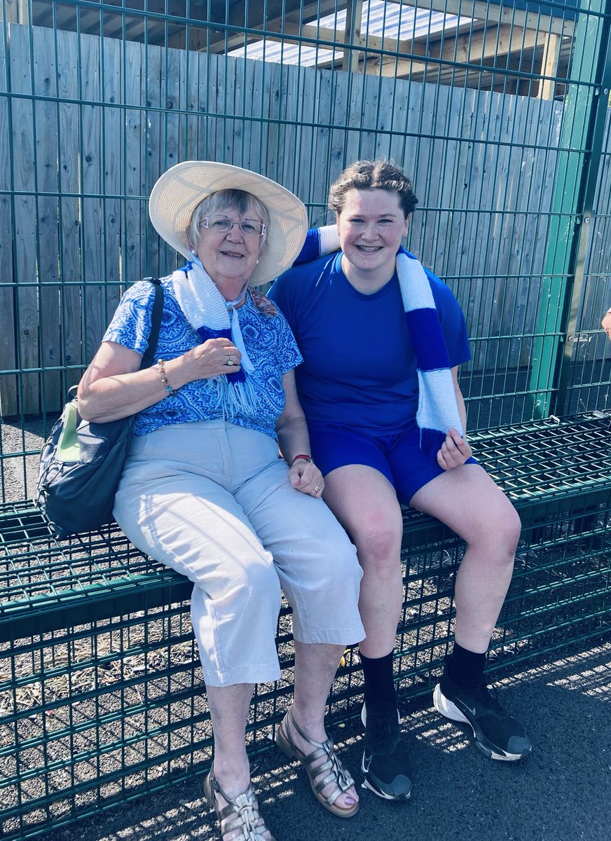 Celebrating with her trusty hand-knitted scarf that was waving proudly today, was Grandmother of Queens player, Anna Newbold! We look forward to seeing that scarf in League 1! Fitba really is a family affair😊&amp; today’s estimated crowd, cheering on the teams was between 350-400!