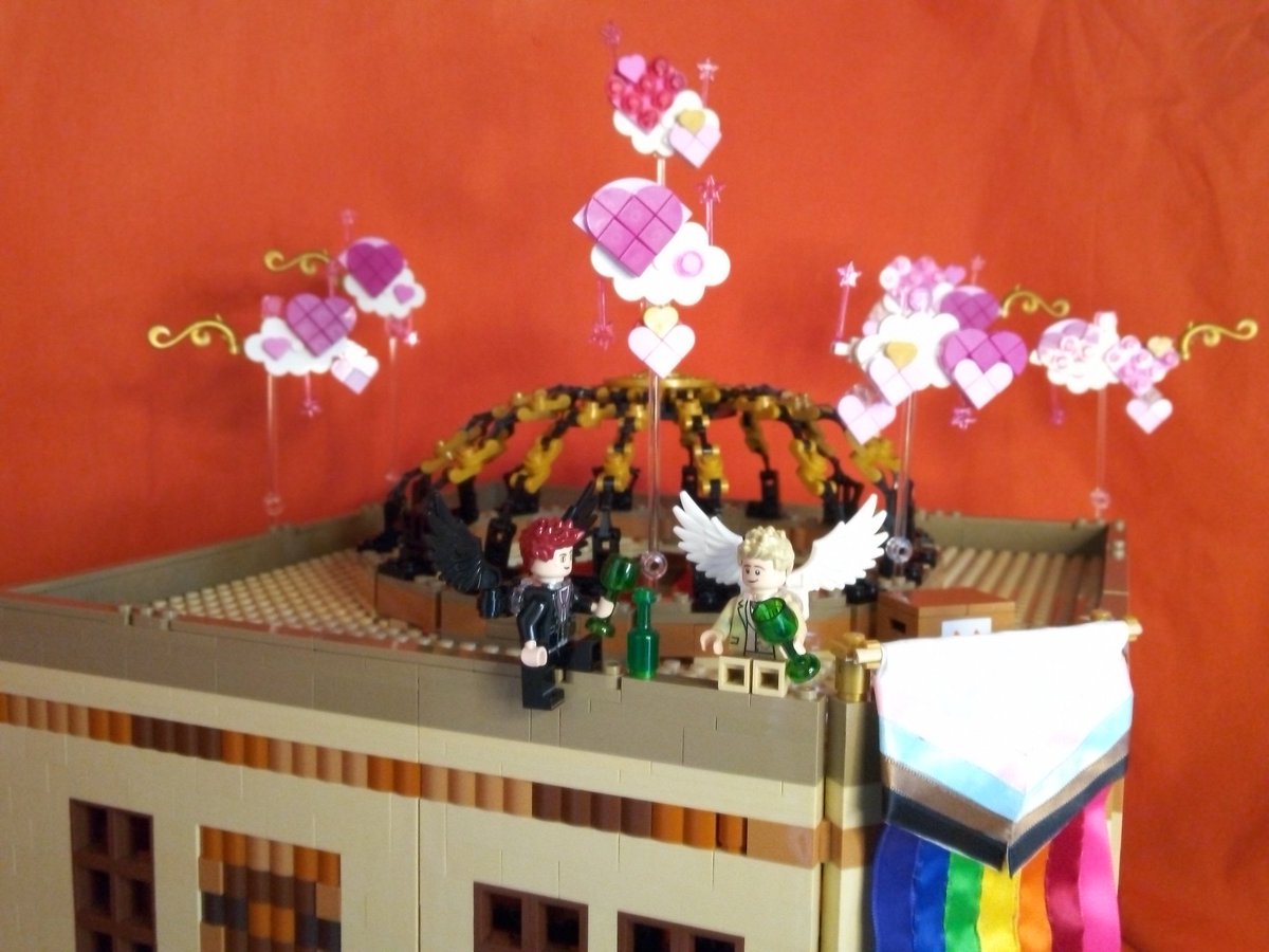 I'm happy that as it turns out I have enough Lego to make a cloud of pink hearts.  If you zoom in on the bookshop window you can just about see my Terry Prachett minifigure, he is sat in a comfortable chair reading a good book.
#whatsinthebox
#lego
#GoodOmens2
#itsagettingcloser