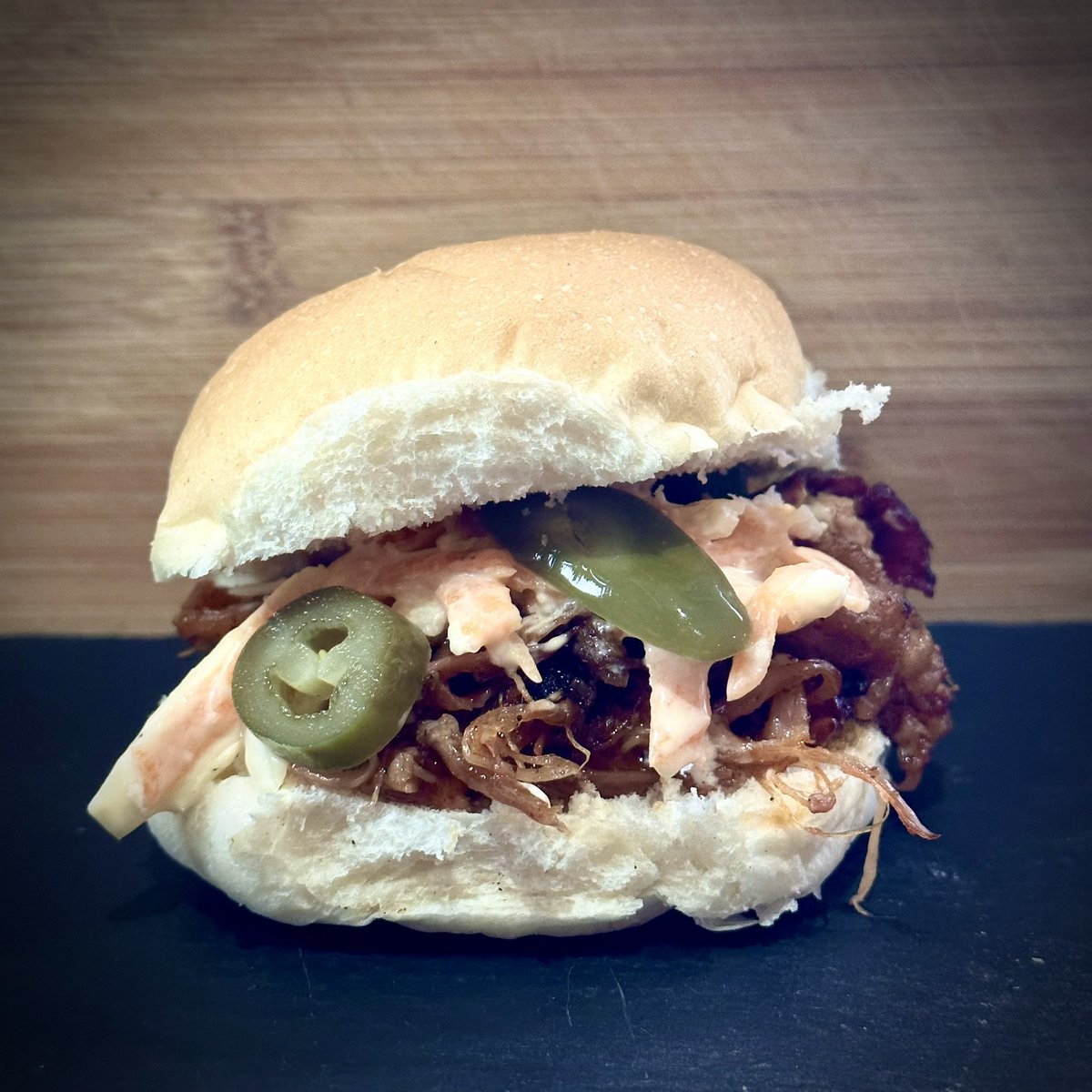 The finished article!  
Bun, homemade slaw, jalapeños.  
How many could you take down?!
#pulledpork