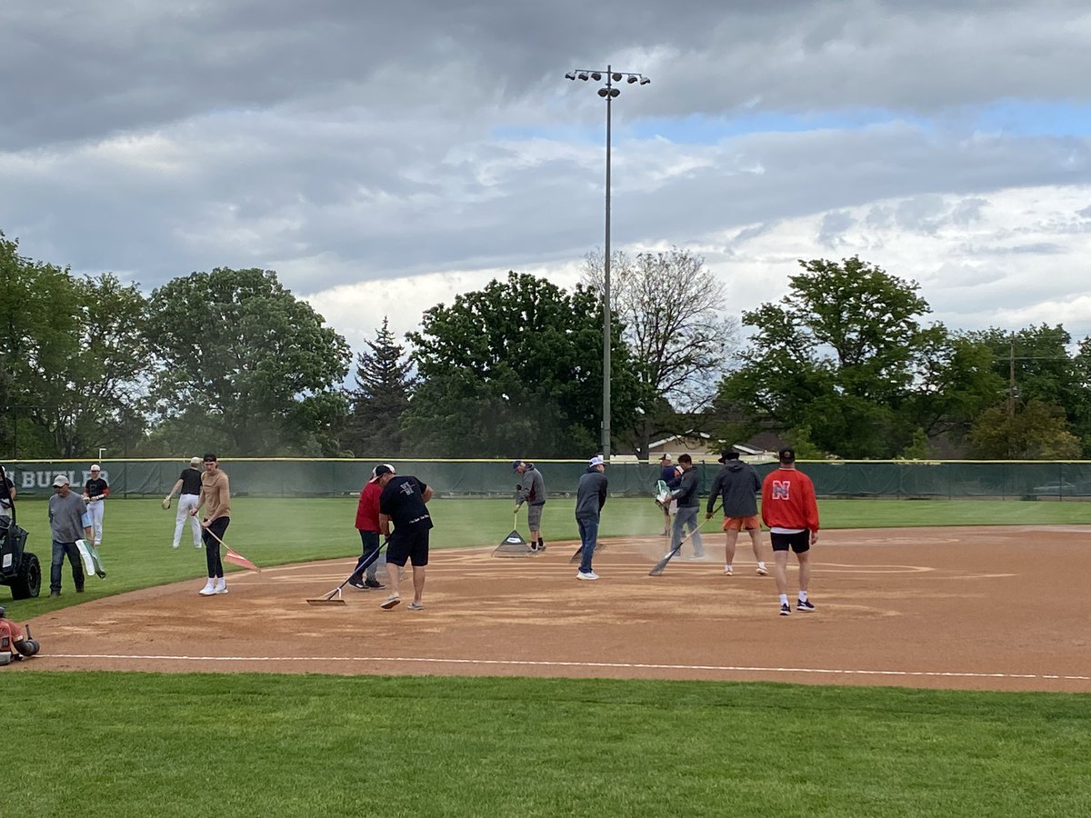 ⚾️Eaton Reds alumni working to get the field ready to continue the state championship game at Butch Butler. #Redstrong #BeEaton @CHSAA @coloradopreps
