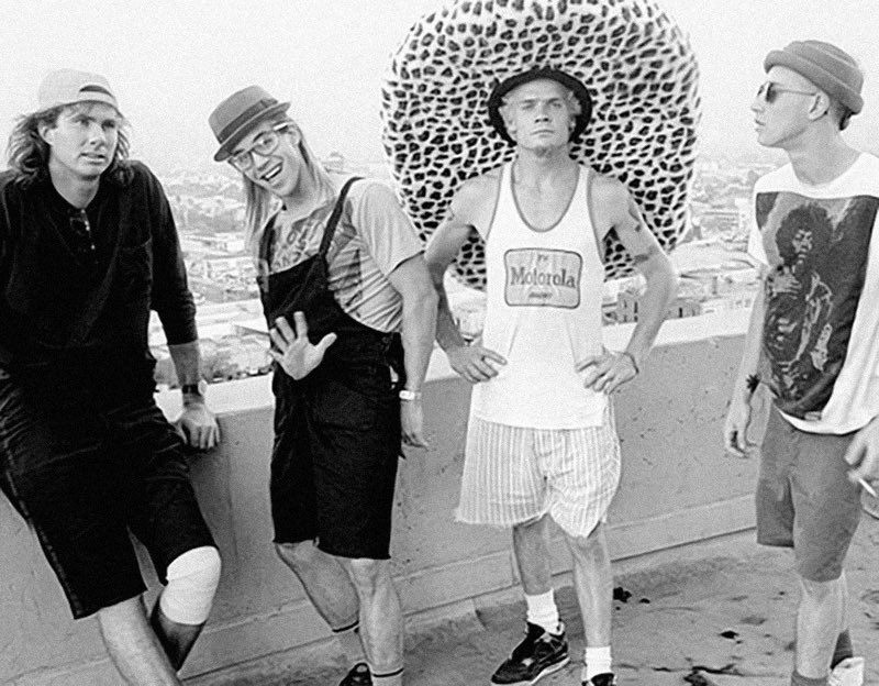 Late July 1989, @RHCPchad , AK, @flea333 & @johnfrusciante on the top of The Capitol Tower talking about their forthcoming lp “Mother’s Milk”. Photo by Drew Carolan