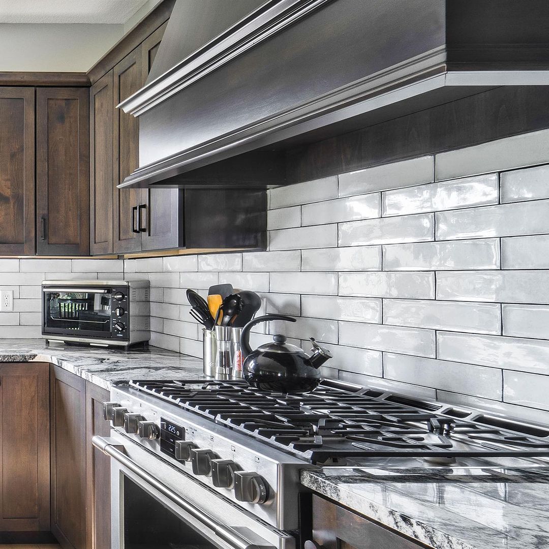 Let our countertops bring your farmhouse into modern day!

The dark wood tones of the cabinets and the subtle grays of the countertops exude warmth and a cozy atmosphere - making every meal prep a delight.

Call 412-429-9324 or visit premiergranite.com to get started!