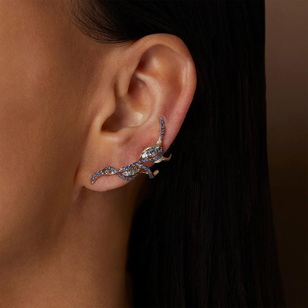 The new Puff Ear Climber from Bibi van der Velden. Crafted from 18K Gold with Purple Sapphires, Blue Sapphires, and Grey Spinels 🖤