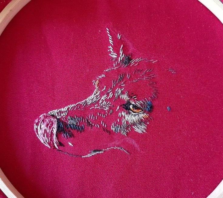embroidering a dog to protect me