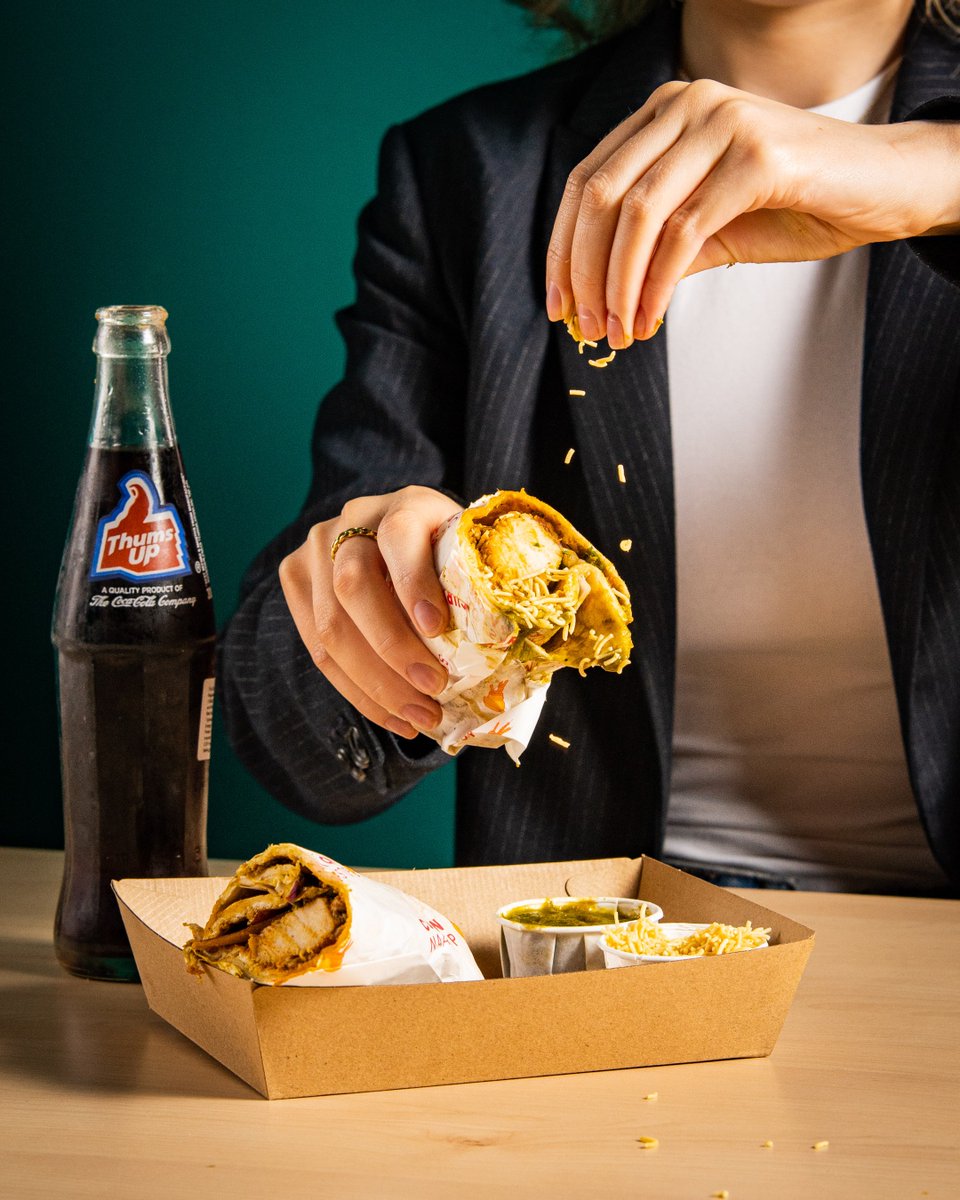 Adding more crunchy sev to our pepper chicken Mumbai Frankie wrap for more texture. 

Find us at Naanstop Express in Cucumber Alley, Seven Dials Market.