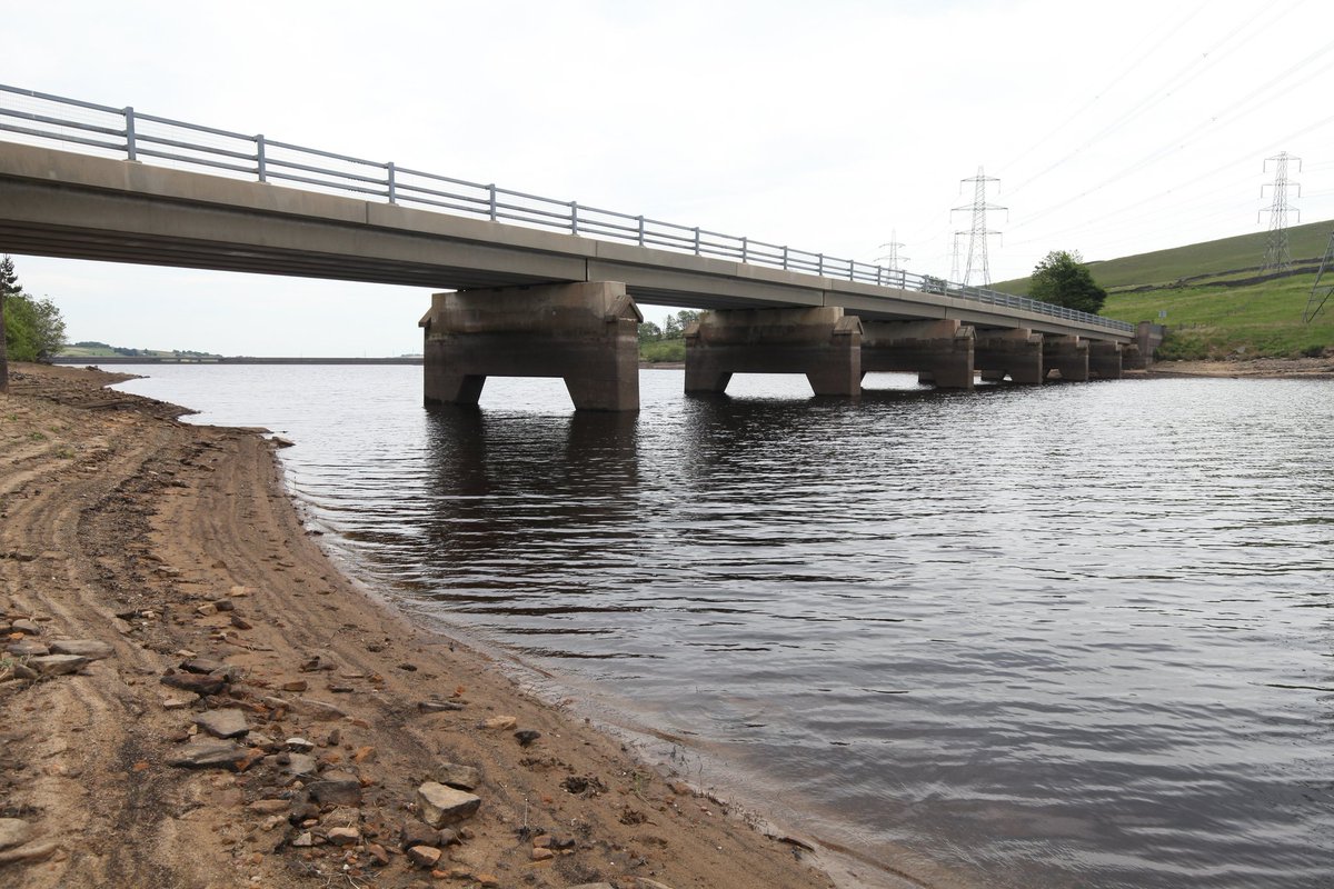 PhilTaylorARPS's tweet photo. Water difference, episode 2. Baitings Reservoir, Yorkshire,full in 2023, compared to 2022 when the old bridge was visible. @jonmillsphoto @SWNSLeeds @pemberton18 @Christopher_R @DannyCrompton1 @DannyLawPhoto  @snapperjim @MENnewsdesk @photojournoadam https://t.co/WPgD9EY57t
