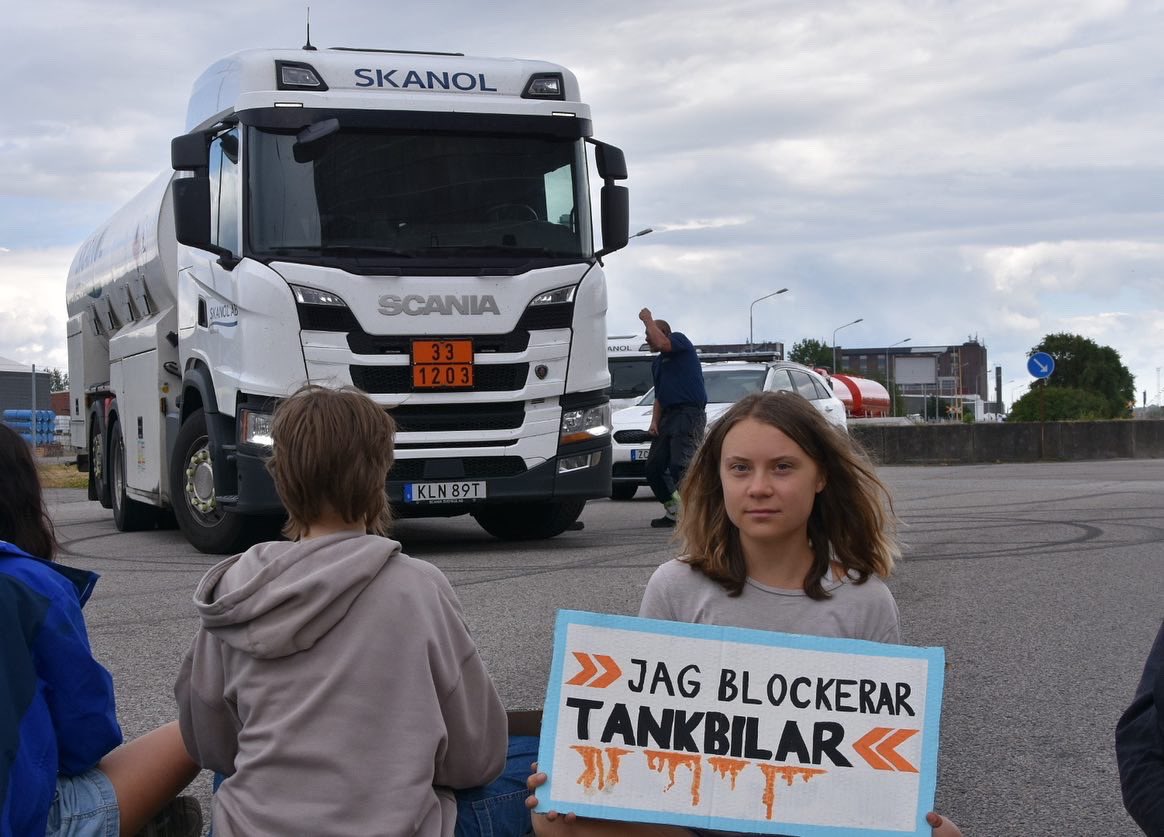 GretaThunberg's tweet photo. Today, for the third day in a row, @TTFramtiden blocked oil tankers in the Malmö oil harbour. The climate crisis is a matter of life and death for countless people. We choose to physically stop fossil fuel infrastructure. We are reclaiming the future. #TaTillbakaFramtiden https://t.co/CTXVKR0Qsi