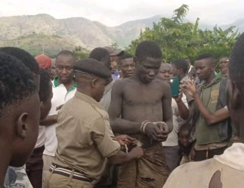 The First ADF Rebel Suspect has been arrested by the Community & handed over to Police. Residents Say He looked happy to be Caught & Was Very Hungry as he didn't even chew the food given to him when eating & took a Jar of water in a Second 😂