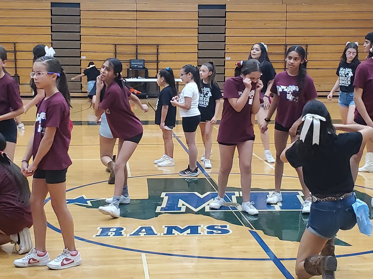 Sybert Cheer warming up for the Montwood Cheer Camp!!