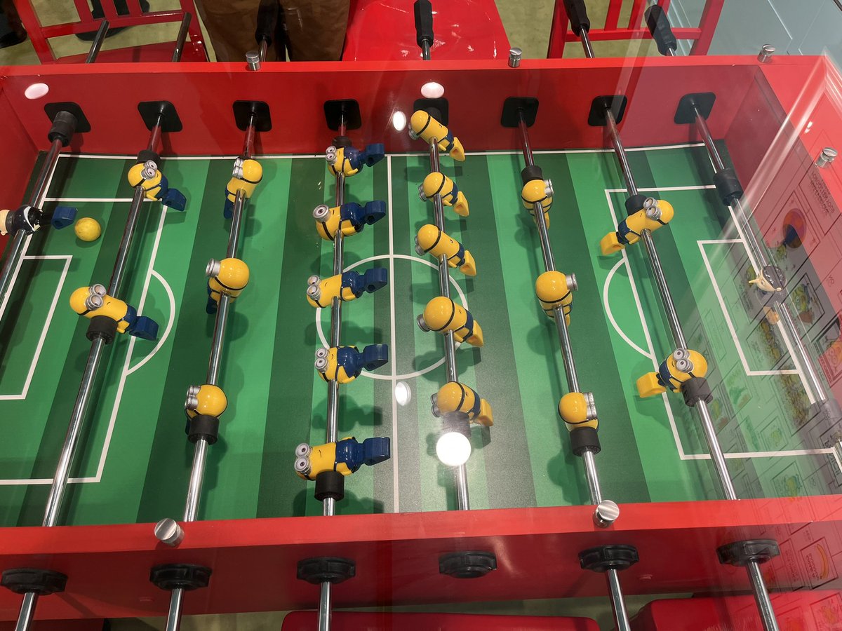 Eating at the MINION FOOSBALL TABLE