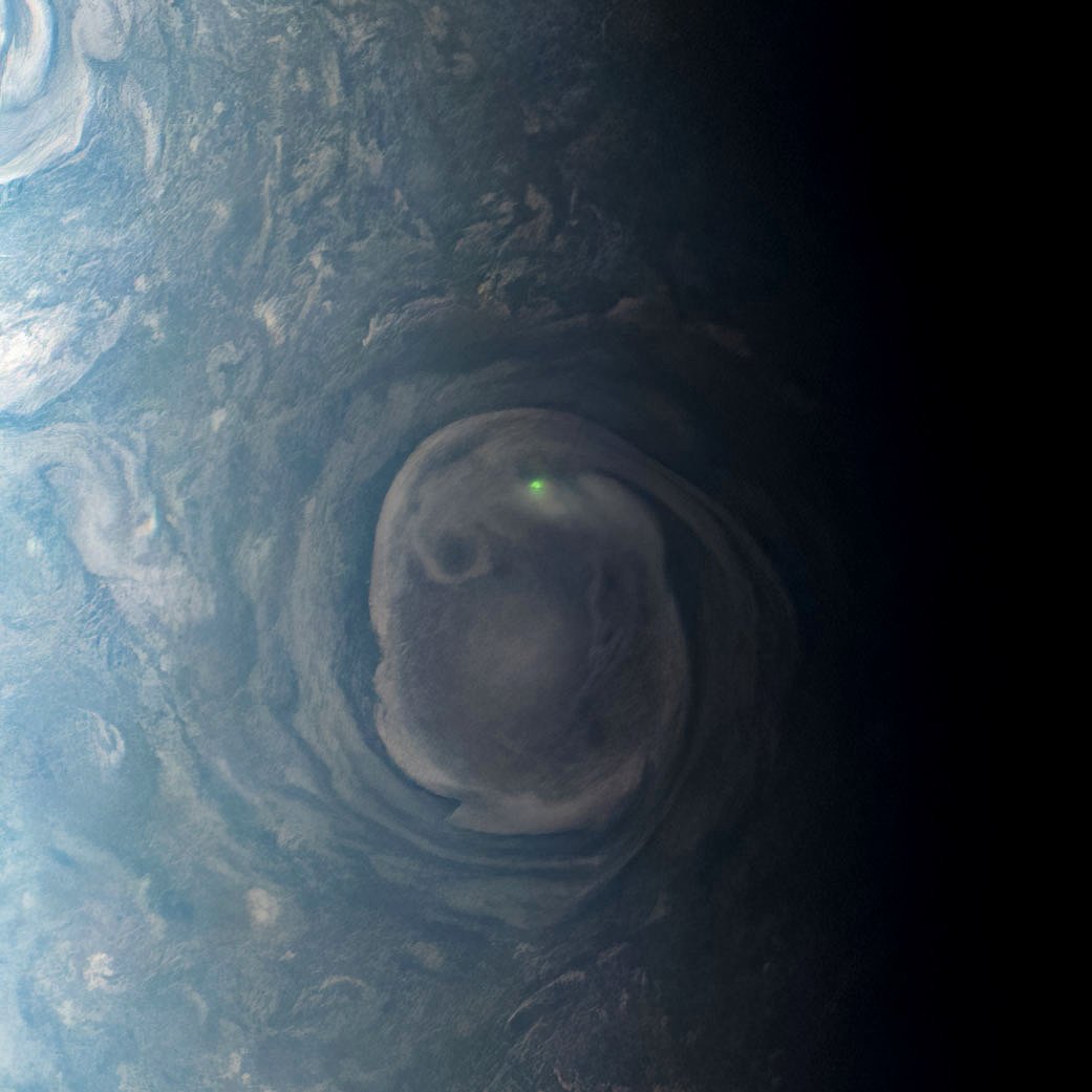 See that green dot?

That's a bolt of lightning.

On Jupiter.