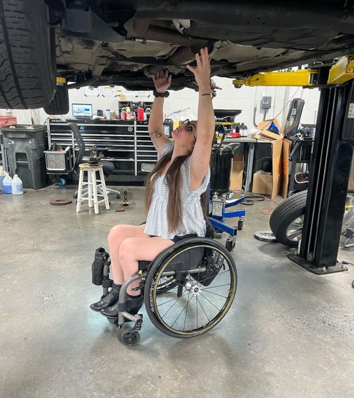 'ThatYT12Chick,' a woman with T12 paraplegic and she works in the car business. Follow her at instagram.com/thatt12chick/ #disabilityemployment #carrepair