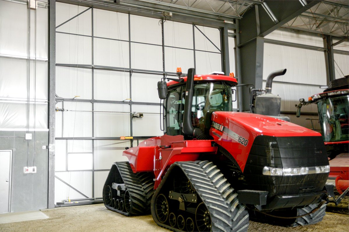 See, we post shop door photos with red tractors too! #DiamondDoors #agtok #casetractors