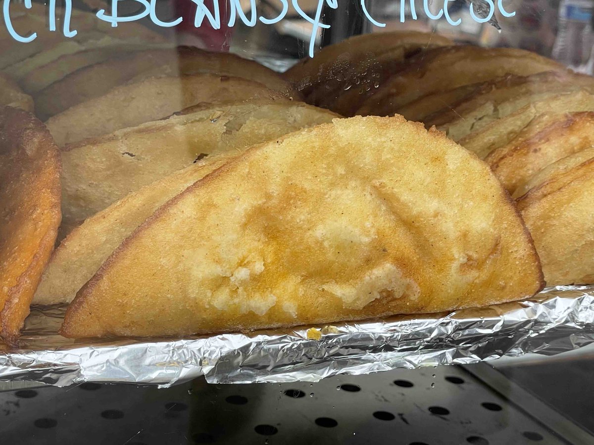 UTRefugeeServe's tweet photo. Feeling hungry? Check out the great food from the Spice Kitchen Incubator  program. The food booths are run by refugees who are currently in the program or graduated from the program. You can try one place or get a little bit from multiple places. #WorldRefugeeDay #Food https://t.co/2ku0xUHHH2