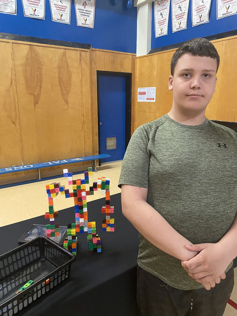 The only kid I know that can design and create a transformer from linking cubes. It has moveable parts and all. #proudteacher #futureengineer #stem