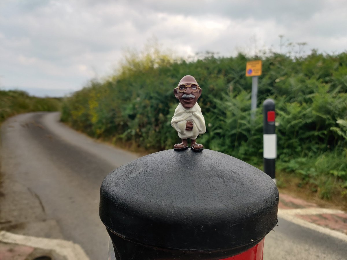 MiniMahatma's tweet photo. If you're not taking the time to balance on top of a bollard, is it really a vacation? #bollard @WorldBollard #minigandhi https://t.co/EcTTzVhm5C