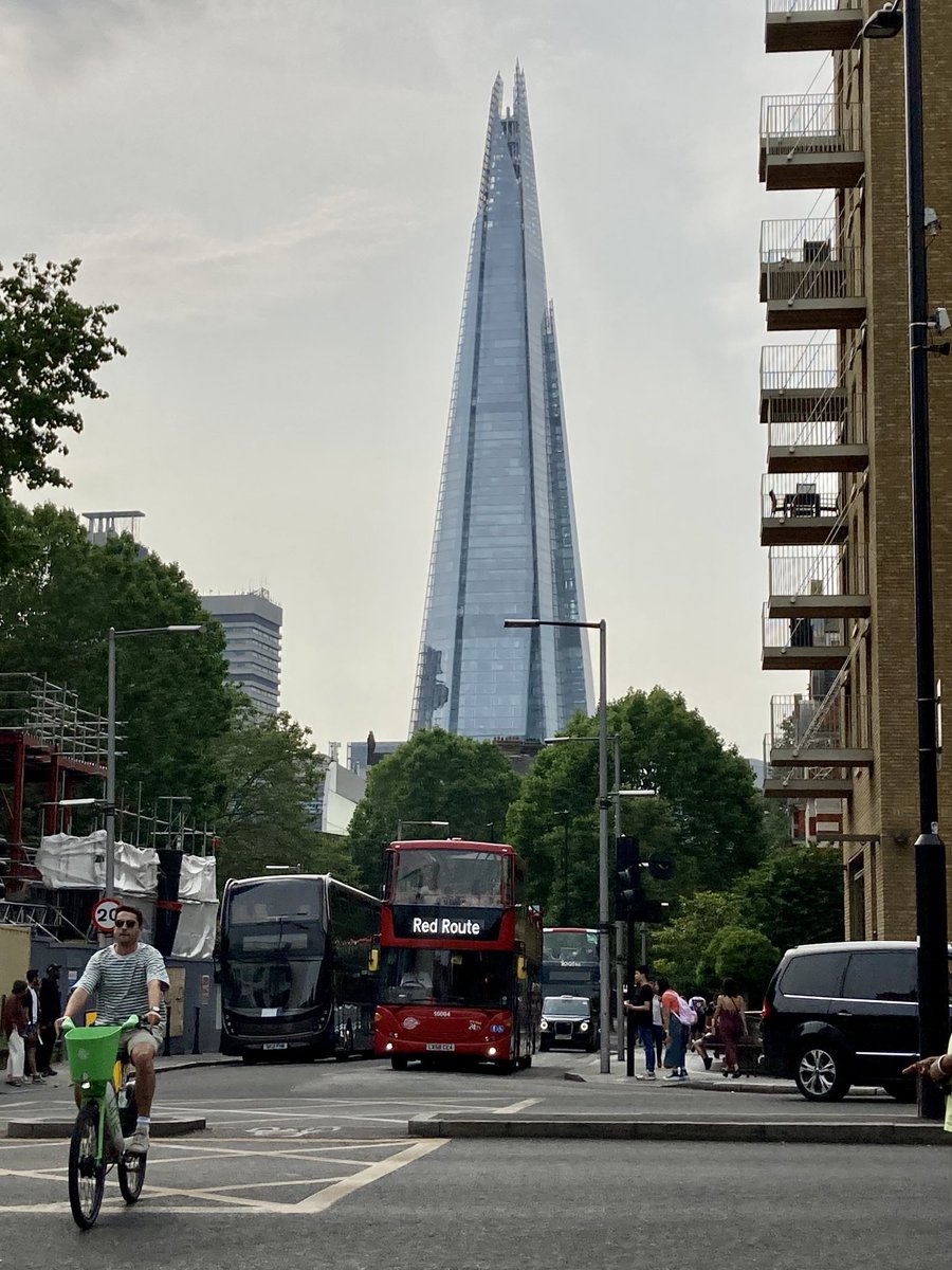 rhansonlaw's tweet photo. Can you believe in this day and age someone would ride through central #London without a bike helmet? #TheShard https://t.co/eb0Dl393fM