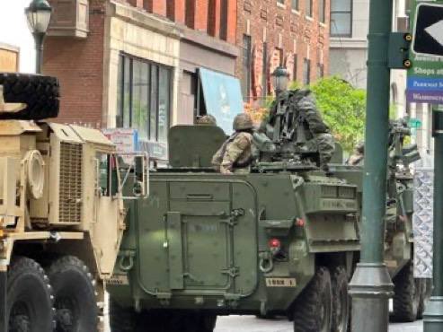 Military troops in at least 15 cities in the US.