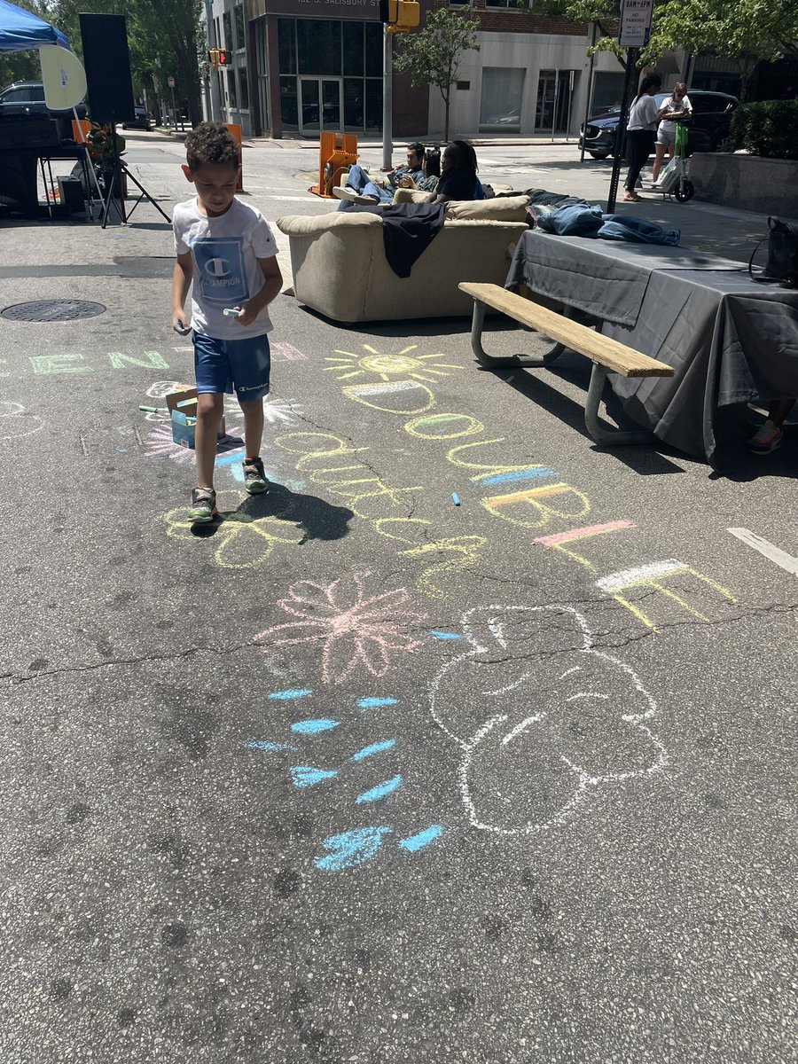 JoanCLyons's tweet photo. Outtakes from @RaleighTranspo’s Hergett Street closure for Double Dutch Festival! Streets are for people and kids to get creative 🎨🌈🖍️

#streetart #streetclosure #strongtowns https://t.co/Ki4ICNxa70