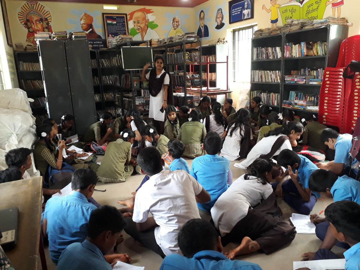 readingkafka's tweet photo. College student volunteers mentoring kids through weekly sessions in rural libraries. #granthamitra #youthleadership https://t.co/1lF05KAUIF
