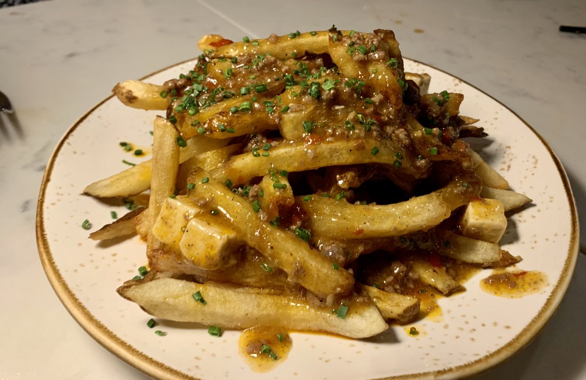 A #Szechuan twist on the French-Canadian classic poutine: Mapo Tofu And Beef Fries by Bone Kettle in Pasadena.