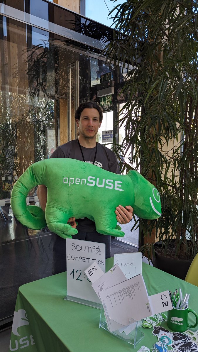 Last day at @devconf_cz and your unique chance to win the big plushy #openSUSE chameleon! Come over to the @openSUSE booth, fill in the quiz and hand it in before 12 PM to win our lovely Geeko, as pictured here with @DefolosDC