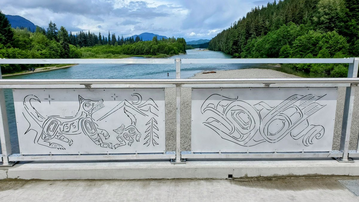 vancouverkeith's tweet photo. A unique feature are the 8 art panels along the sidewalk fence, each representing one of the Haisla clans. The art was designed by Haisla artists Paul Windsor &amp; Nathan Wilson. After months of planning, @WSPCanada's Thien Tong and I were thrilled to meet Paul in person. https://t.co/7TQUGvEkXS