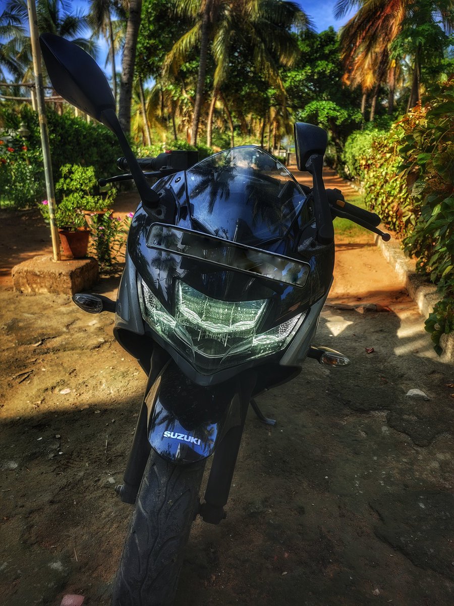 Taking a break from the road with my trusty ride 🏍️ #MotorcycleLife #RoadTrip #BikerLife #RideOrDie #TwoWheels #OpenRoad #AdventureTime #TravelGoals #ImageToCaptionAI 📸