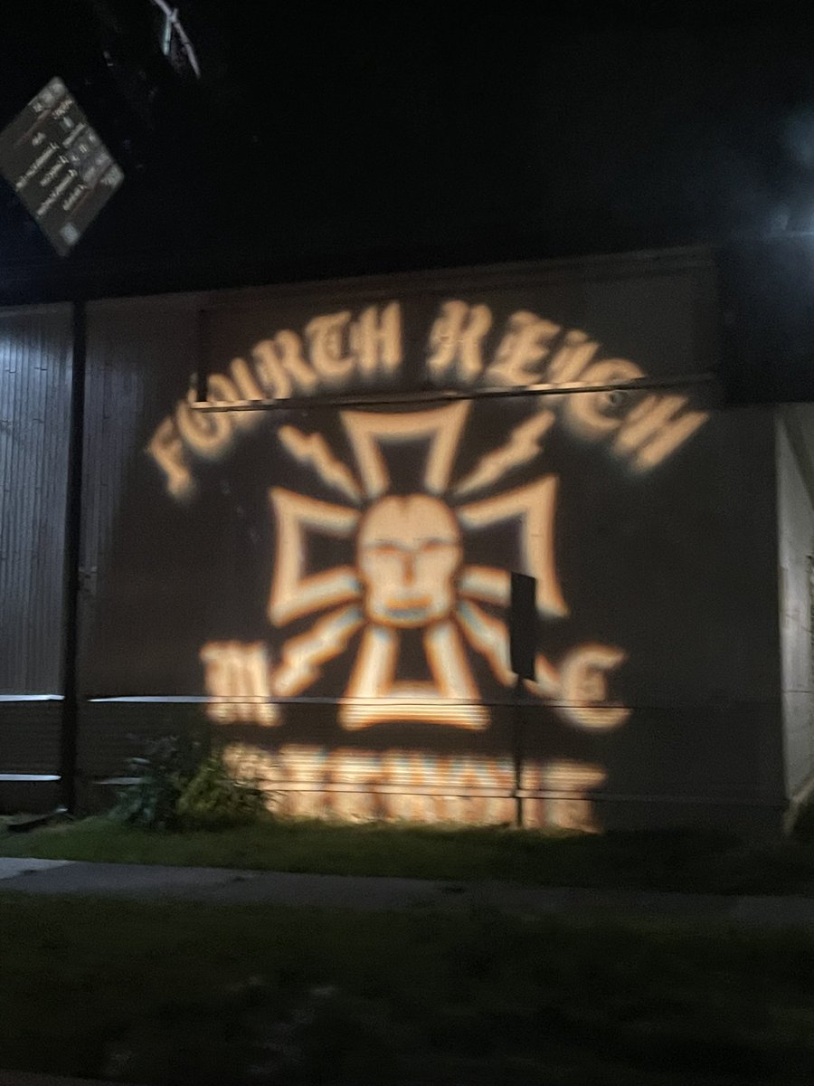 lee_cleaveland's tweet photo. ⚠️ N@zis in Royal Oak ⚠️
Pulled over last night because I saw this iron cross projected on the side of a building at 674 W Eleven Mile. Further research I learned that next door at 702 W Eleven Mile  is the Fourth Reich Motorcycle Club. Fuck fascism &amp; stay safe https://t.co/NTkvEK8qxc