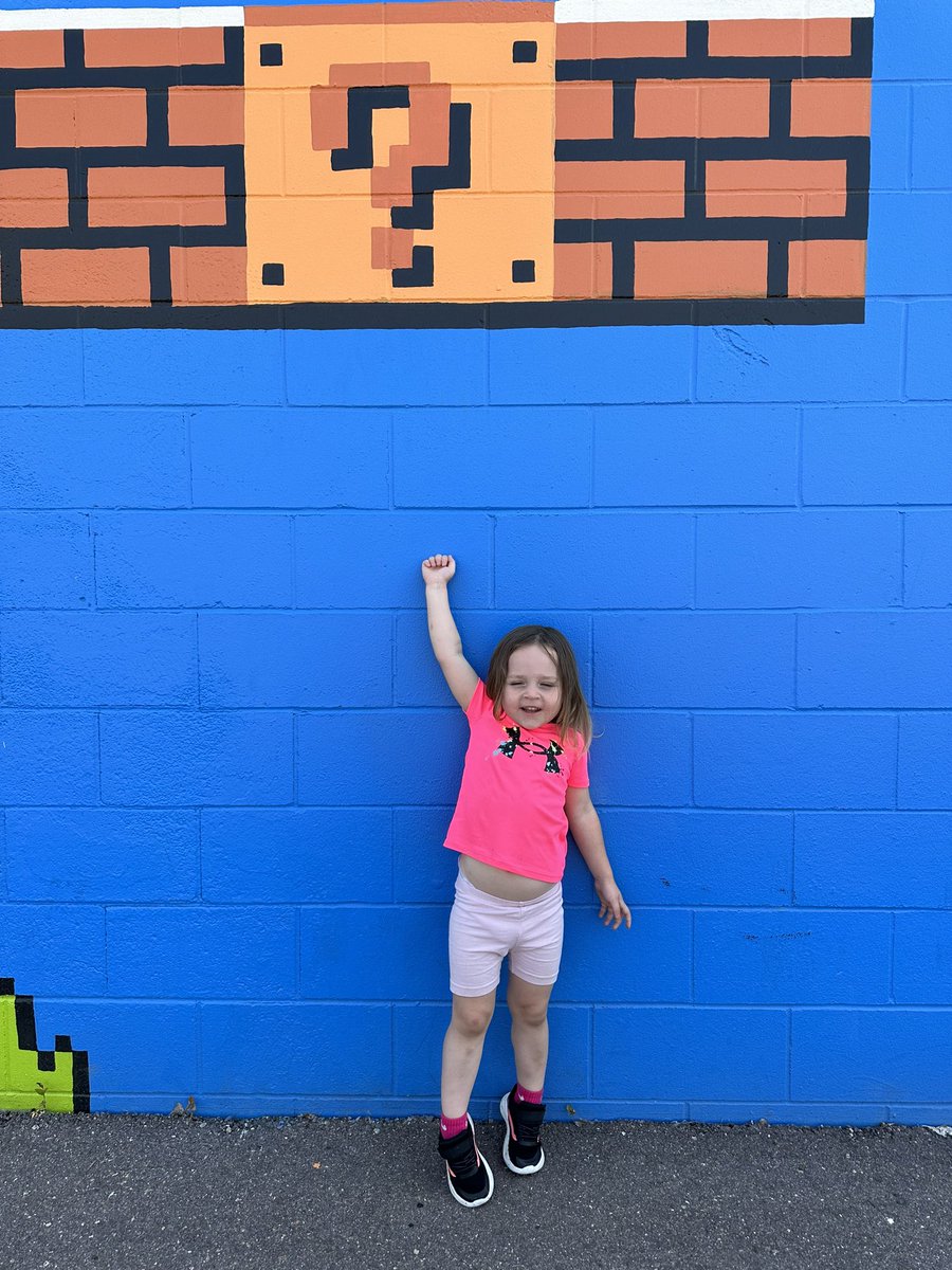 TylerJRoney's tweet photo. After seeing the Super Mario movie multiple times, my daughter was super pumped about the Mario Wall in Sioux Falls. She yelled “Mamma Mia!”😂 #SFMarioWall https://t.co/PE1JG10vqe