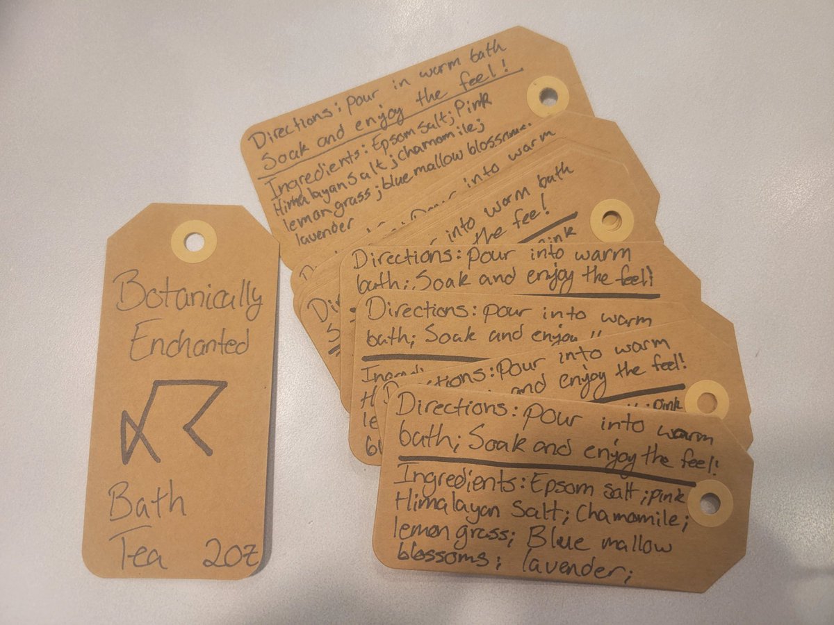 EnchantBotanic's tweet photo. Hand writing tags for the farmers market I'm attending Friday, have about 80 of these to make! https://t.co/FT73Lsqukc
