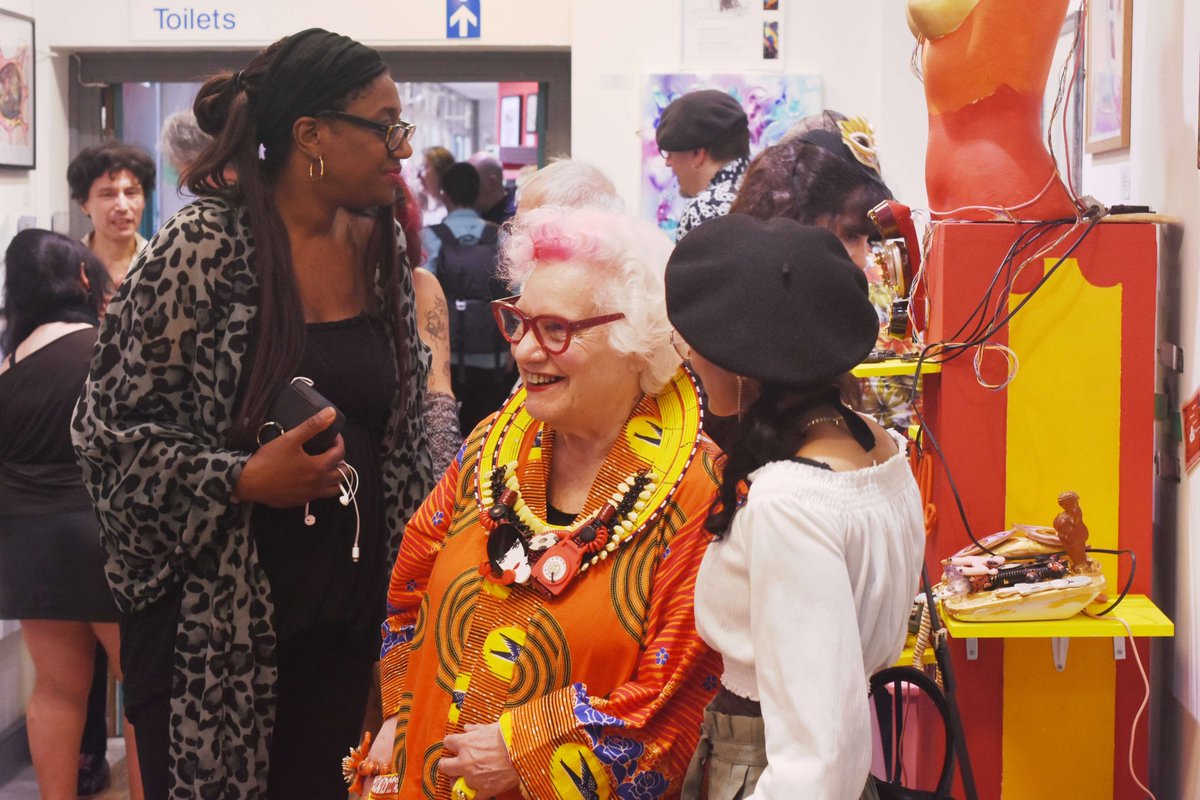 Visitors at the opening night of EMERALD 20 @CI_NHS Conference Centre Gallery on Friday 16 June. EMERALD 20 marks the 20th anniversary of <a href="/ArtsProjectLdn/">The Arts Project</a> and is  open to visitors on Mondays to Fridays (except Bank Holidays) until 29 September.